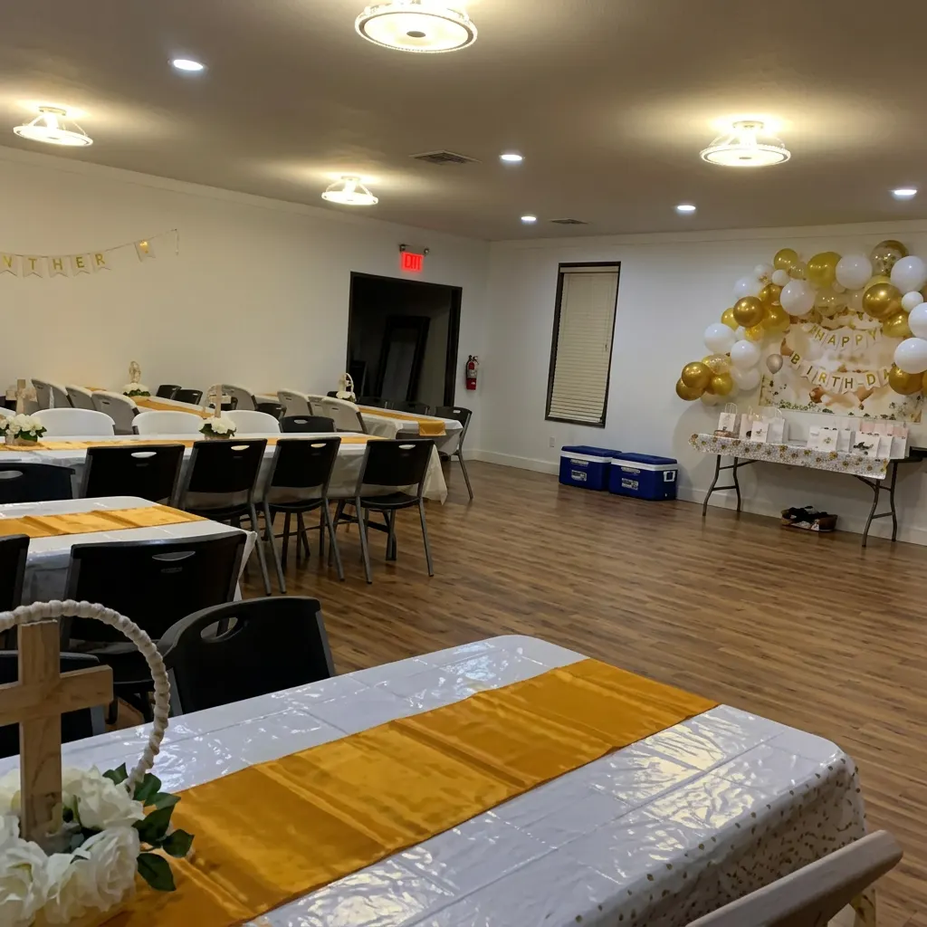 Hall set with banquet tables and chairs at Memories Event Place.